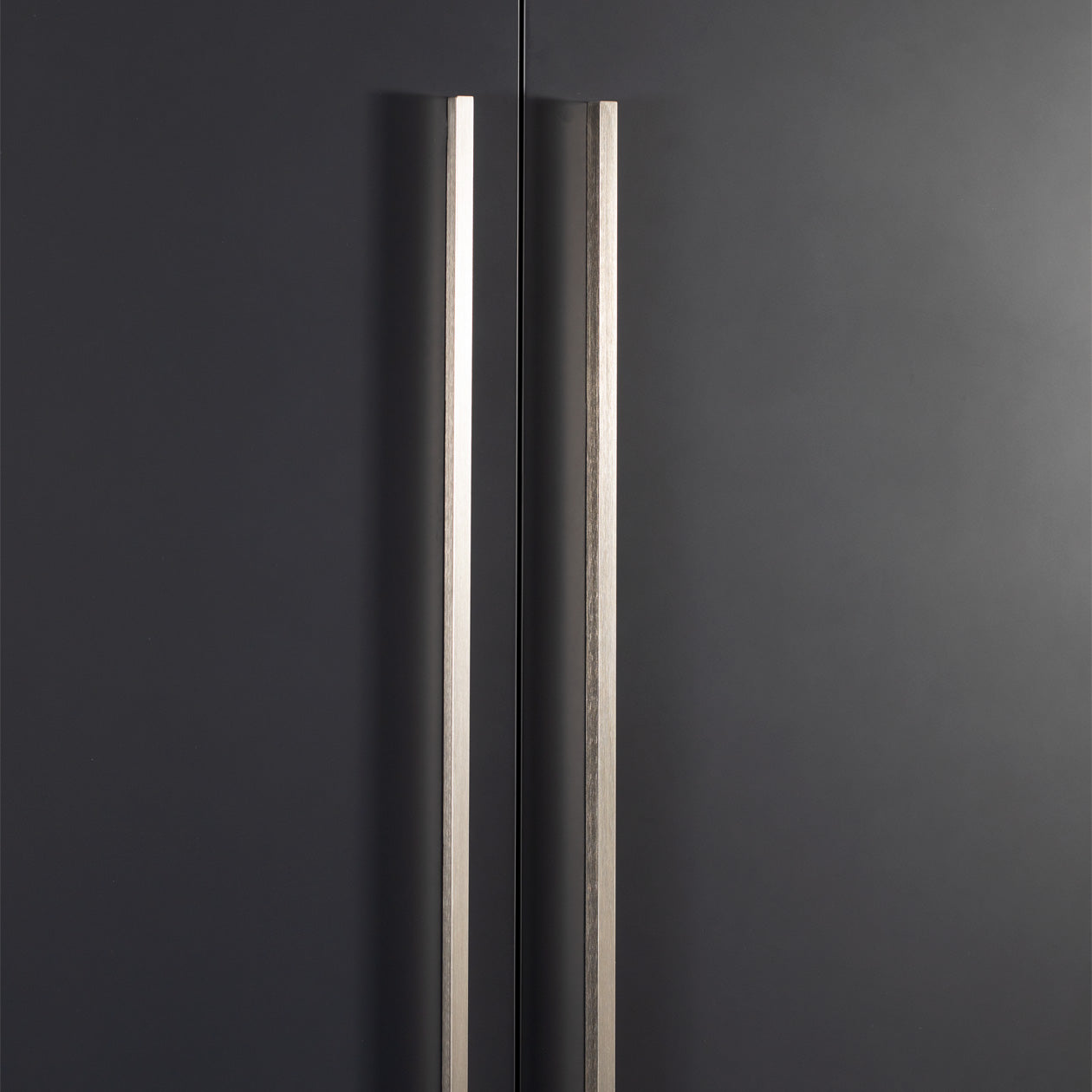 Momo ANGLE Cabinet Pull Handle in dark bronze finish, sleek modern design for kitchen or furniture cabinetry.
