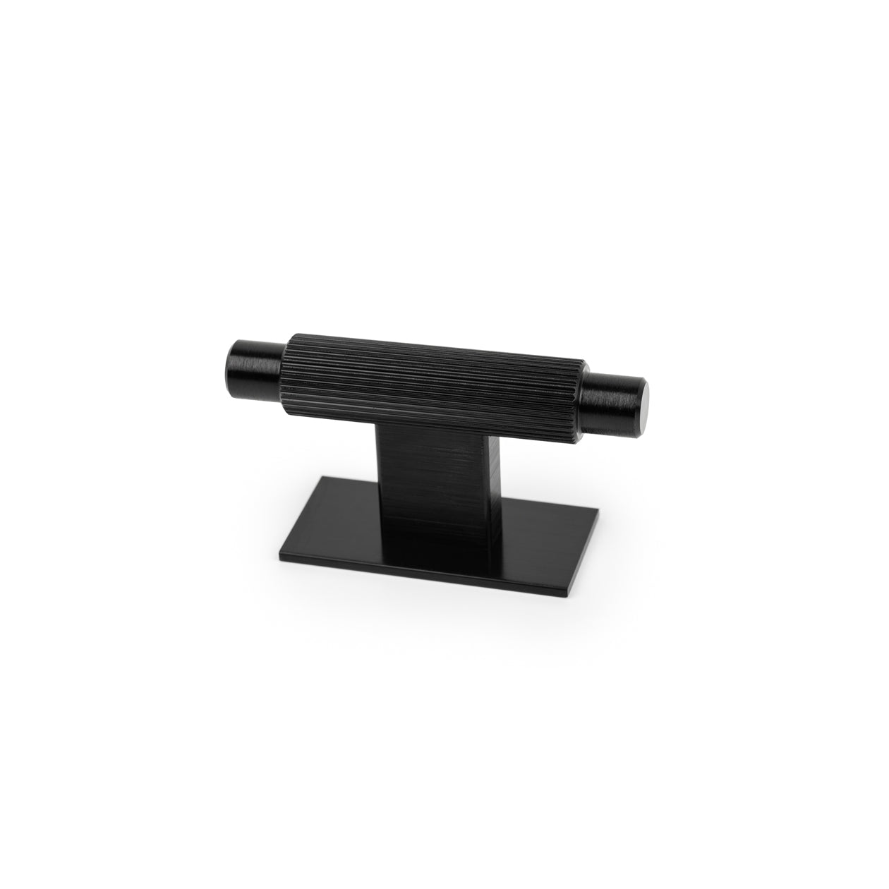 Momo ARPA cabinet T-pull handle with backplate in brushed bronze finish, mounted on a cabinet door.