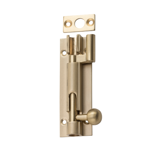 Tradco 75mm barrel bolt offset lock showing a metal latch with mounting screws on a wooden surface.
