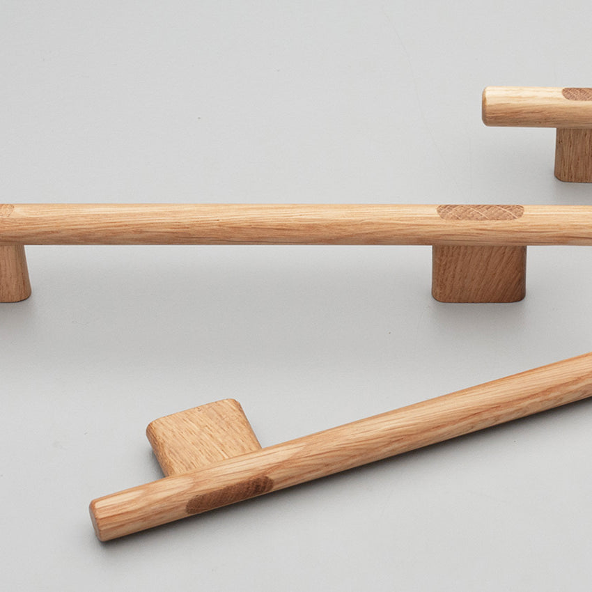 Kethy Koge Timber T-Pull door handle in natural wood finish, featuring a sleek T-shaped design for modern interior doors.