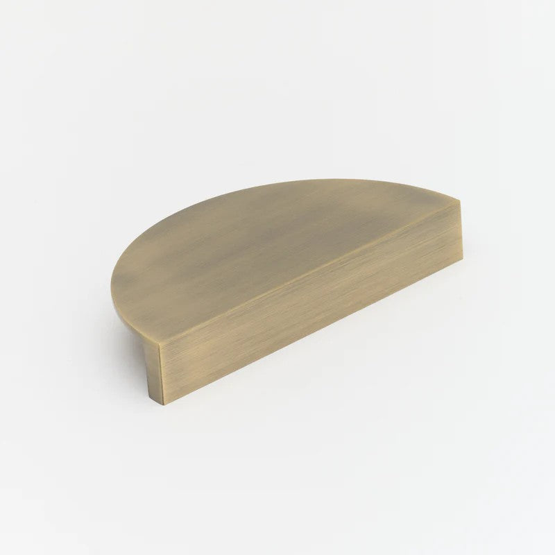 Lo & Co Luna Pull XL architectural hardware in brushed brass finish, featuring sleek, modern design for furniture or cabinetry.