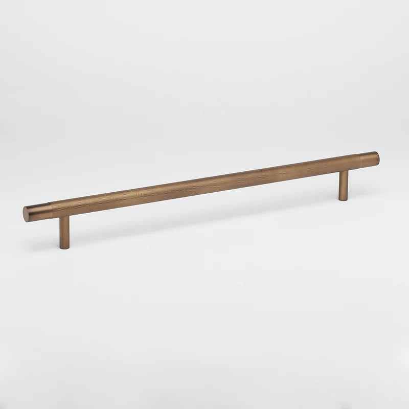 Lo & Co Kintore appliance pull cabinet hardware in brushed bronze finish, featuring sleek, modern design for kitchen or furniture drawers.