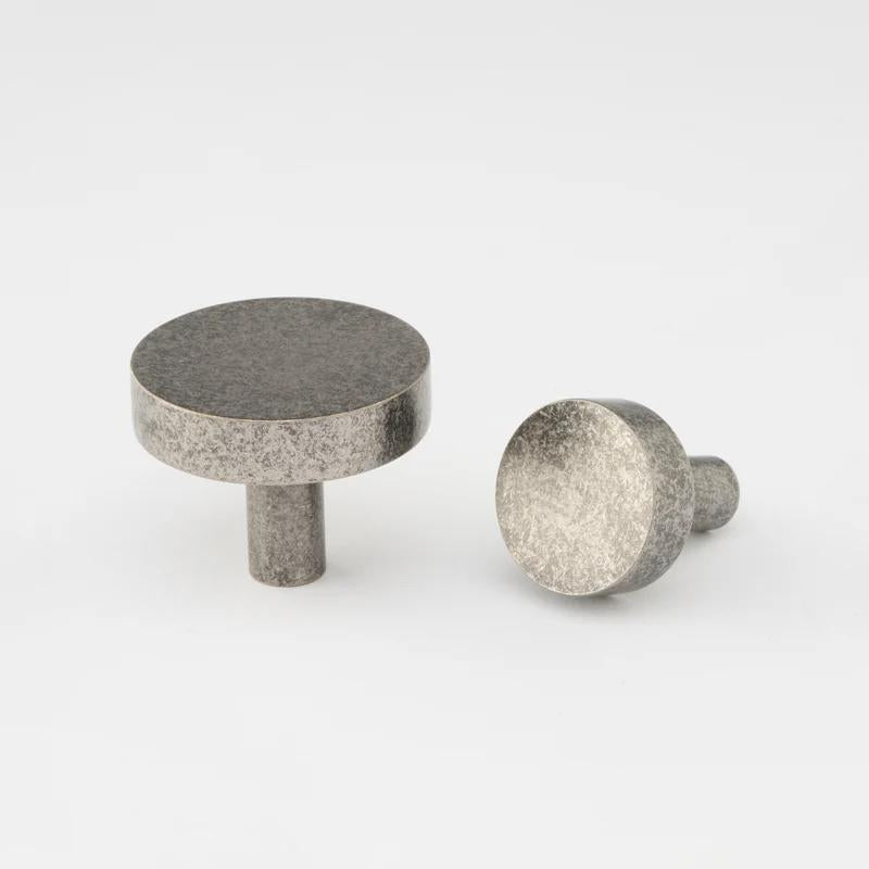 Lo & Co Ascot Knob cabinet hardware in a bronze finish, featuring a rounded design with decorative detailing.