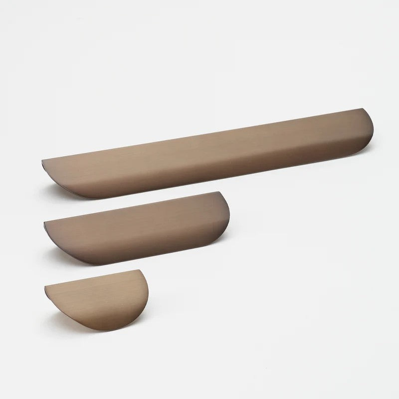 Lo & Co Carlisle Pull cabinet hardware in brushed bronze finish, featuring a sleek, modern handle for kitchen or furniture cabinets.