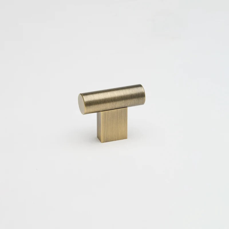 Lo & Co T-Knob architectural hardware in brushed aluminum with sleek, modern design for cabinets and furniture.