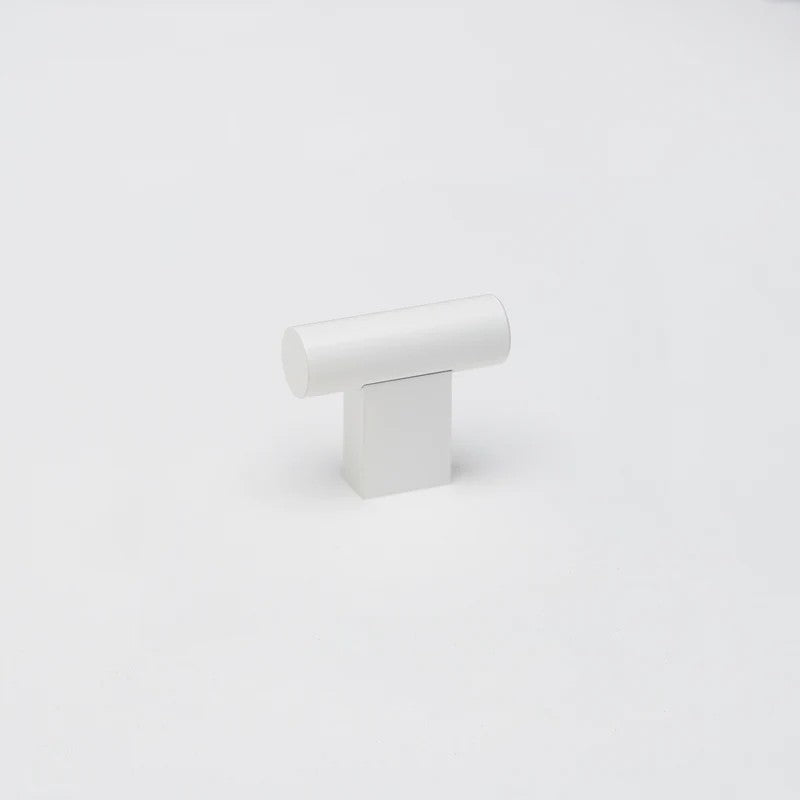 Lo & Co T-Knob architectural hardware in a sleek, modern finish, mounted on a door or cabinet for a stylish look.