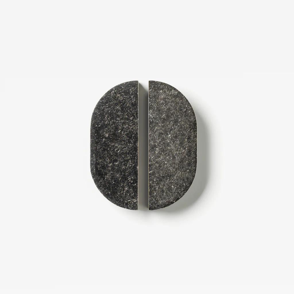 Lo & Co Interiors Isla Pull cabinet hardware in a sleek, modern design with a bronze finish, mounted on a cabinet door.