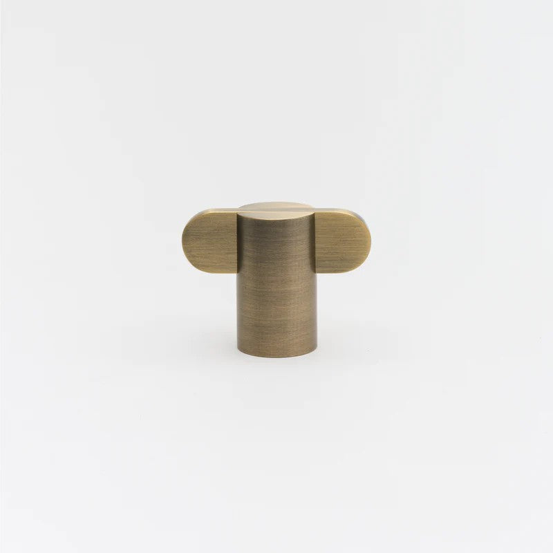 Lo & Co Intersect Knob, architectural hardware with sleek metal finish, mounted on a door or cabinet.