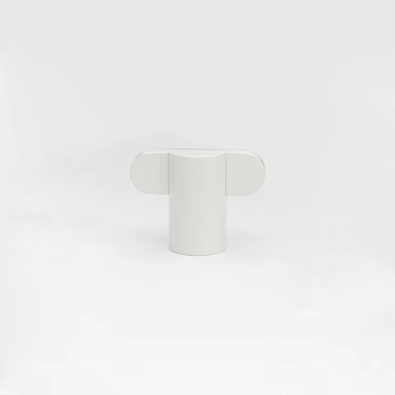 Lo & Co Intersect Knob, architectural hardware, showing a sleek metal knob with modern intersecting design on a door.