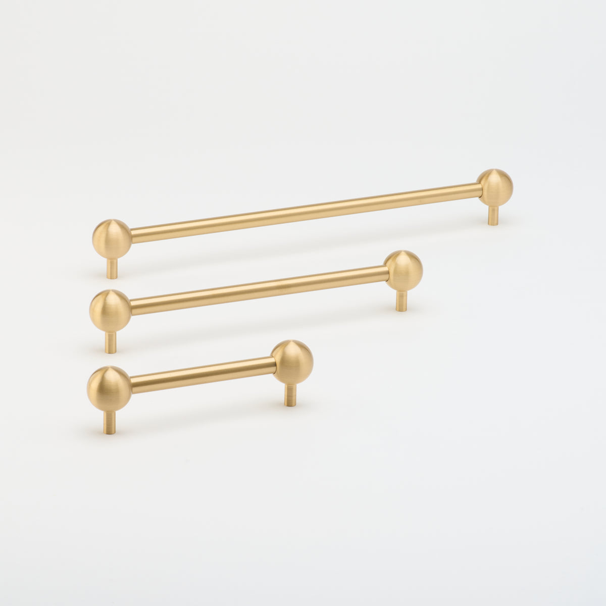 Lo & Co Sphere Pull cabinet hardware in brushed nickel, round knob with smooth finish for modern furniture and cabinetry.