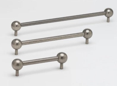 Lo & Co Sphere Pull cabinet hardware in bronze finish, featuring a round, textured design for kitchen or bathroom cabinets.