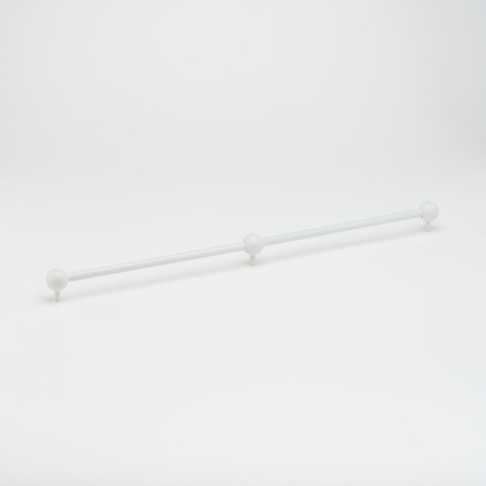 Lo & Co Sphere Appliance Pull, cabinet hardware with a sleek spherical design, in a brushed finish, mounted on a cabinet door.