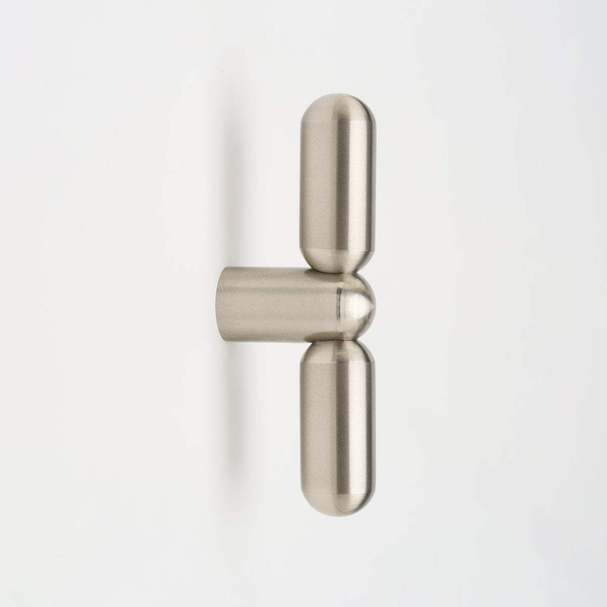 Lo & Co Tubby T-Pull cabinet hardware in brushed nickel, featuring a modern T-shaped handle design for kitchen or bathroom cabinets.