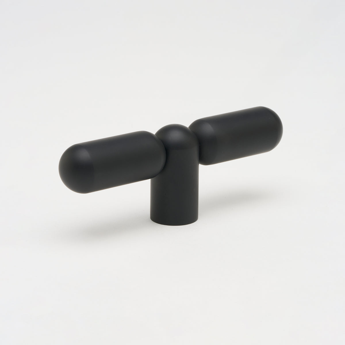 Lo & Co Tubby T-Pull cabinet hardware in matte black with a sleek, modern T-shaped handle for kitchen or bathroom cabinets.