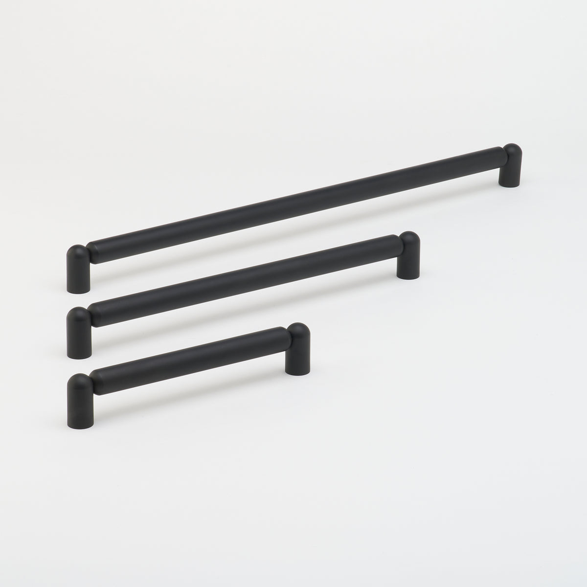 Lo & Co Tubby pull handle for cabinets, featuring a sleek, modern design in a brushed finish, made by Lo & Co Interiors.