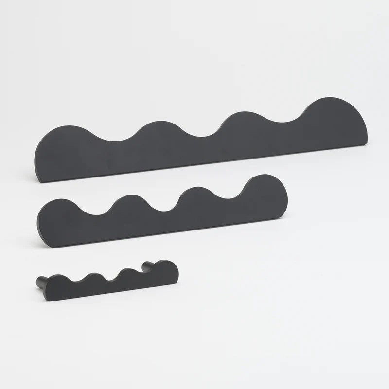 Lo & Co Karu Pull architectural hardware in polished finish, featuring sleek, modern design with ergonomic handle for doors or cabinets.