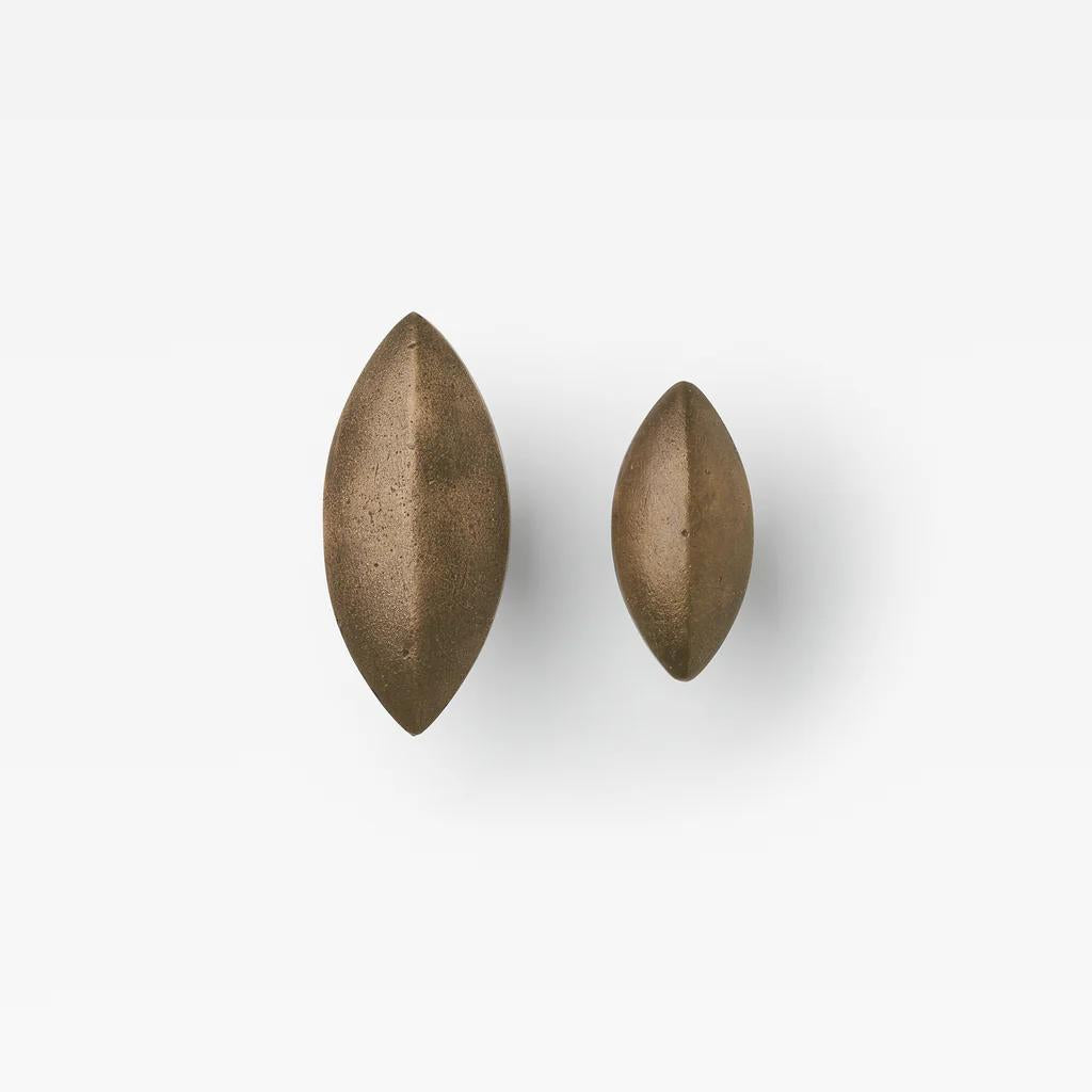 Lo & Co Cast Almond Cabinet Knob in oil-rubbed bronze finish, showcasing a classic hardware design for cabinets and drawers.