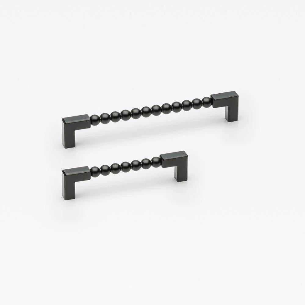 Small Lo & Co ORBE Cabinet Pull from Lo & Co Interiors, showcasing sleek architectural hardware with a modern finish.