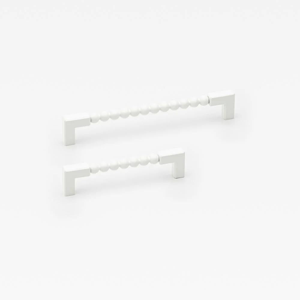 Small Lo & Co ORBE cabinet pull in architectural hardware style, featuring a sleek, modern design with a polished finish.