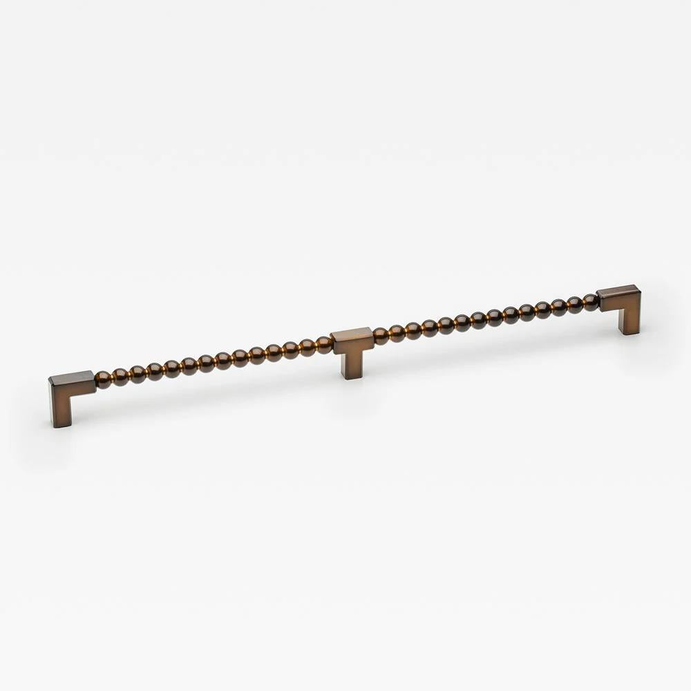 Large Lo & Co ORBE cabinet pull from Lo & Co Interiors, showcasing brushed bronze finish and sleek modern design.
