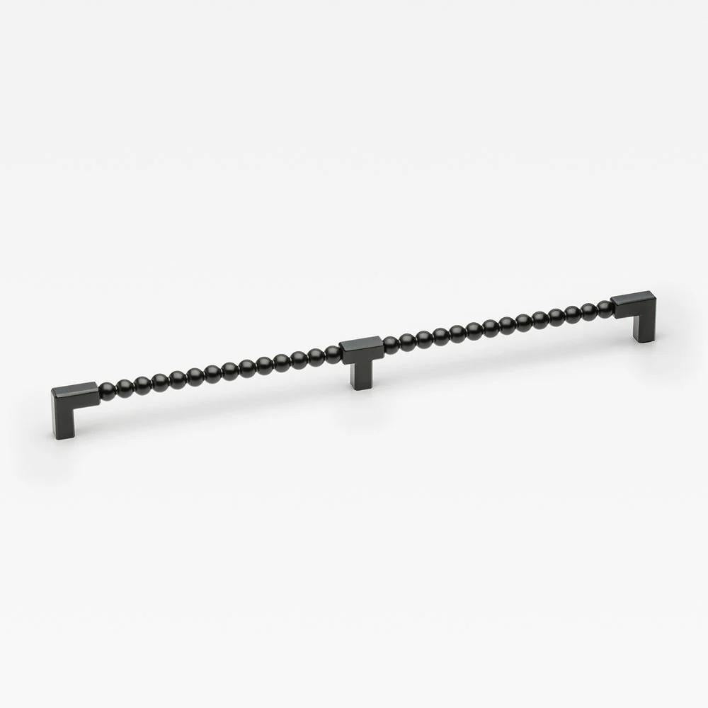Large Lo & Co ORBE cabinet pull, stylish cabinet hardware with a modern finish, shown in a close-up view.