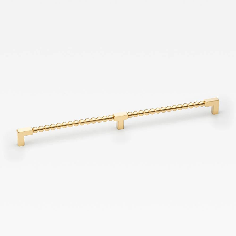 Large Lo & Co ORBE cabinet pull mounted on a cabinet, showcasing sleek modern hardware by Lo & Co Interiors.