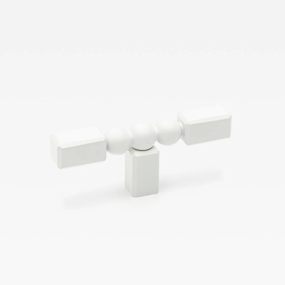 Small Lo & Co ORBE Cabinet T-Pull in matte black, featuring a sleek, modern design for kitchen or furniture cabinets.