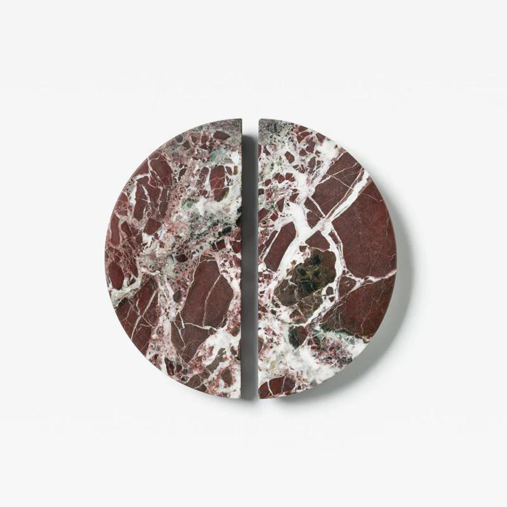 Pair of Lo & Co Interiors Arc Marble Cabinet Handles in rose marble with sleek metal bases, ideal for modern furniture.
