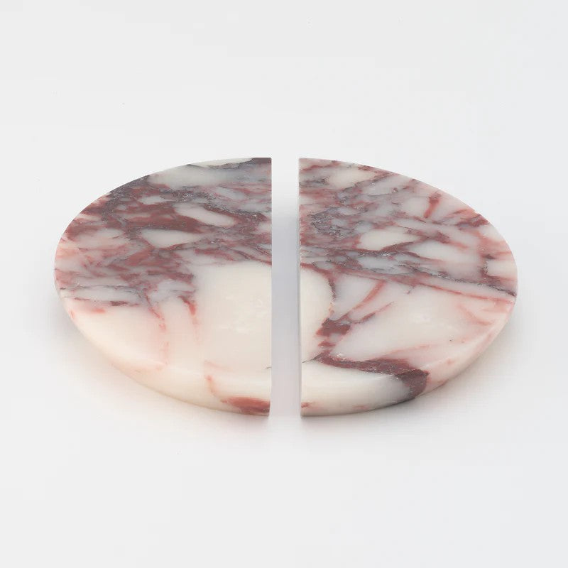Pair of Lo & Co Interiors Arc Marble Cabinet Handles with sleek marble finish and modern brass hardware.