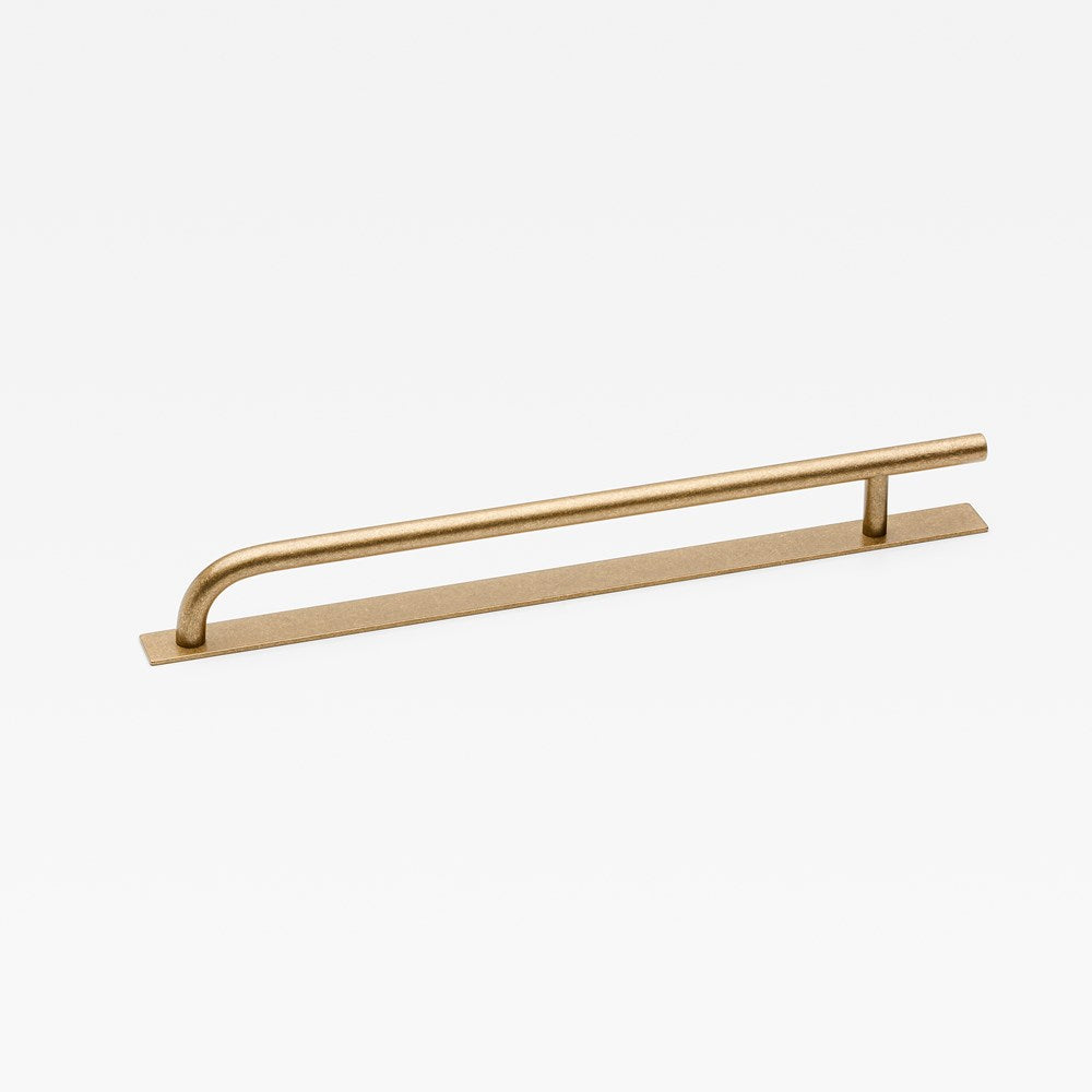 Lo & Co Brera appliance pull handle with backplate, architectural hardware in a brushed metal finish, shown on a modern cabinet.