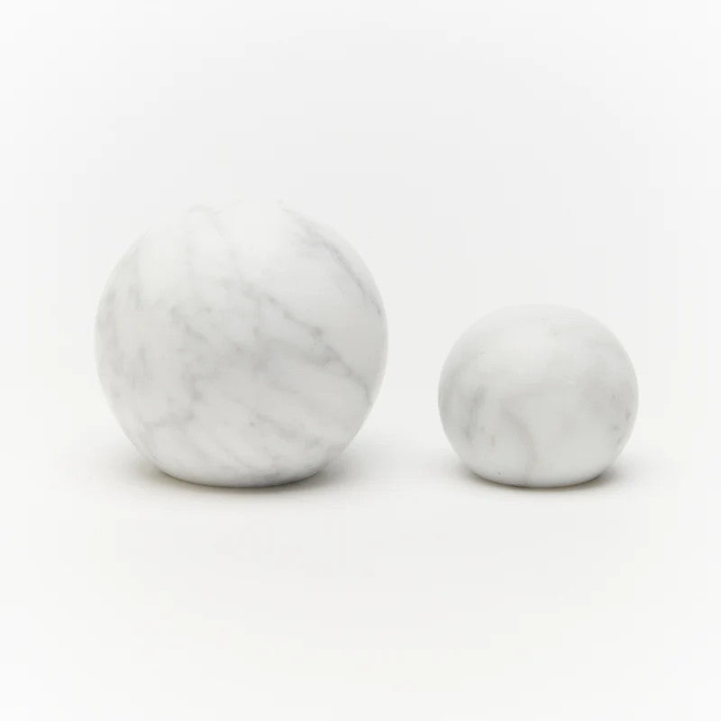 Lo & Co Interiors Hubble Knob in marble, elegant cabinet hardware with a smooth, rounded design and natural marble finish.
