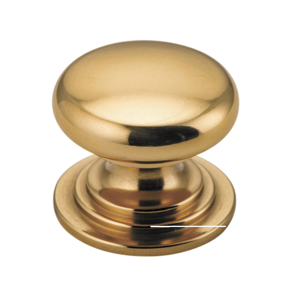 Iver Sarlat cupboard knob, architectural hardware in antique brass finish, showing detailed round design and mounting hardware.