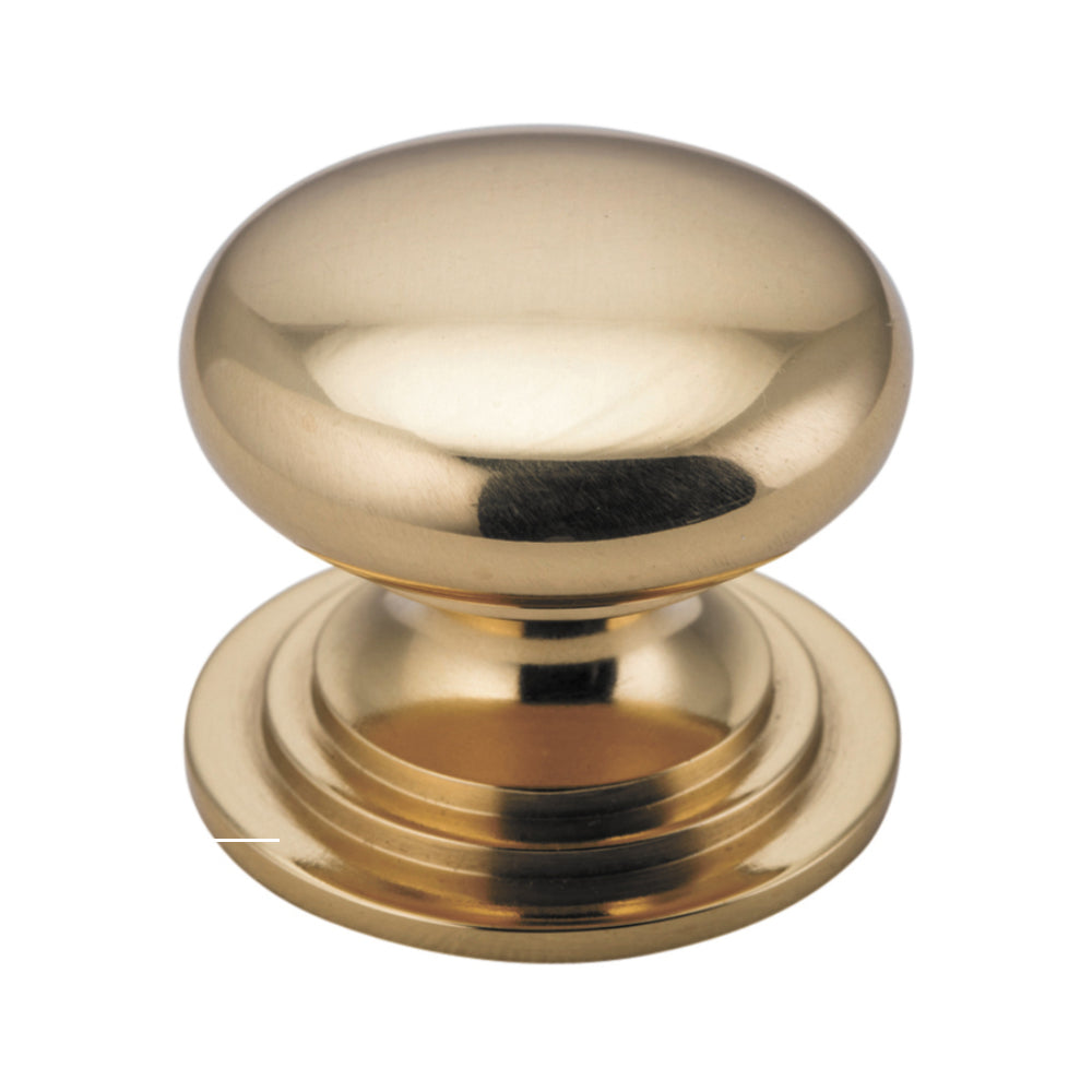 Iver Sarlat cupboard knob, architectural hardware with a rounded metal handle, mounted on a wooden door for cabinet decor.