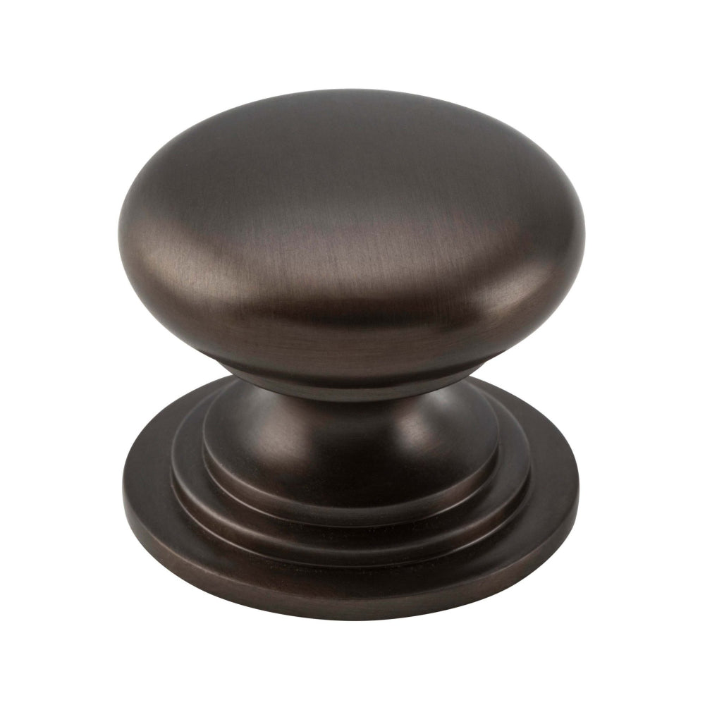 Iver Sarlat cupboard knob, architectural hardware in antique brass finish, featuring a rounded design with decorative detailing.