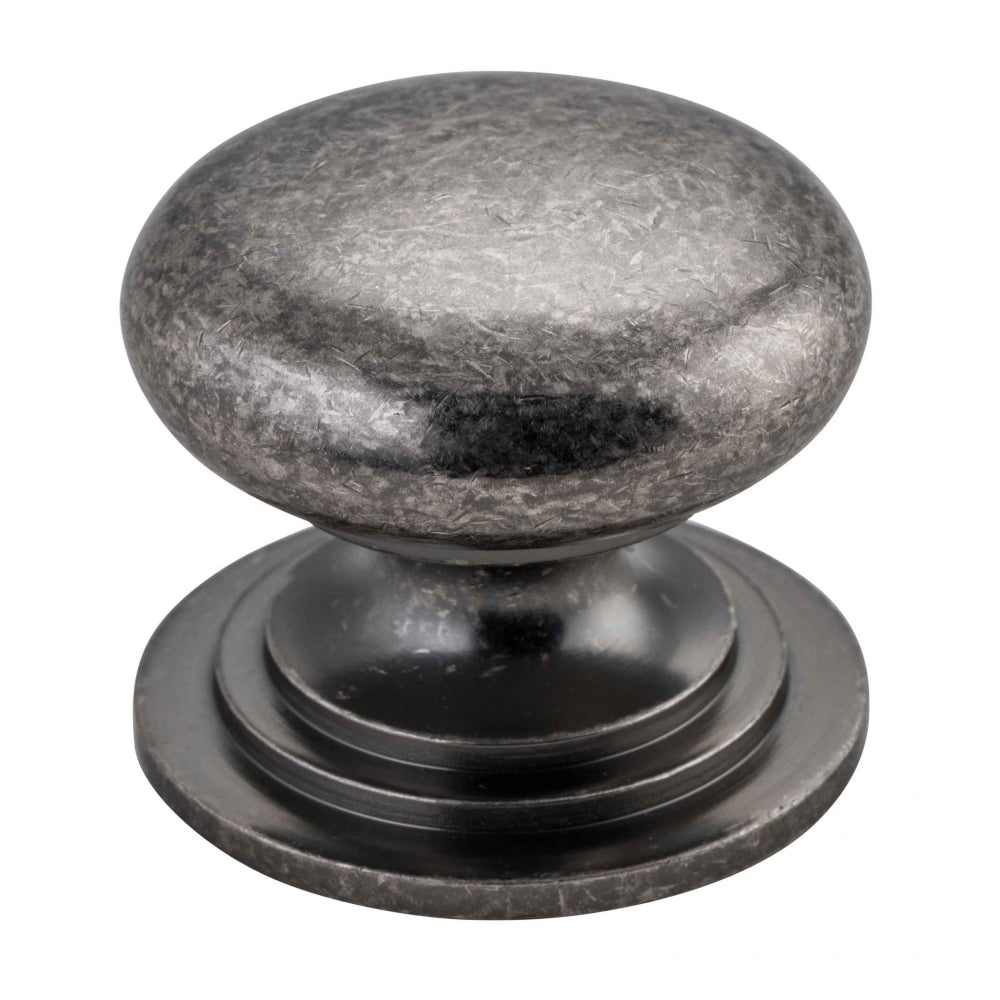 Iver Sarlat cupboard knob from architectural hardware, showing a close-up of the brass handle with a smooth, rounded design.