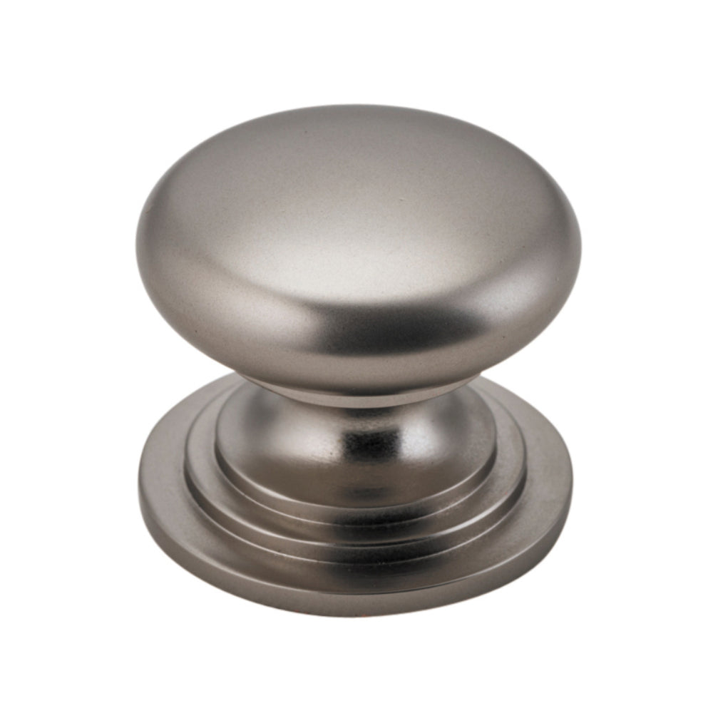 Iver Sarlat Cupboard Knob from architectural hardware collection, featuring a classic metal design on a wooden cabinet door.