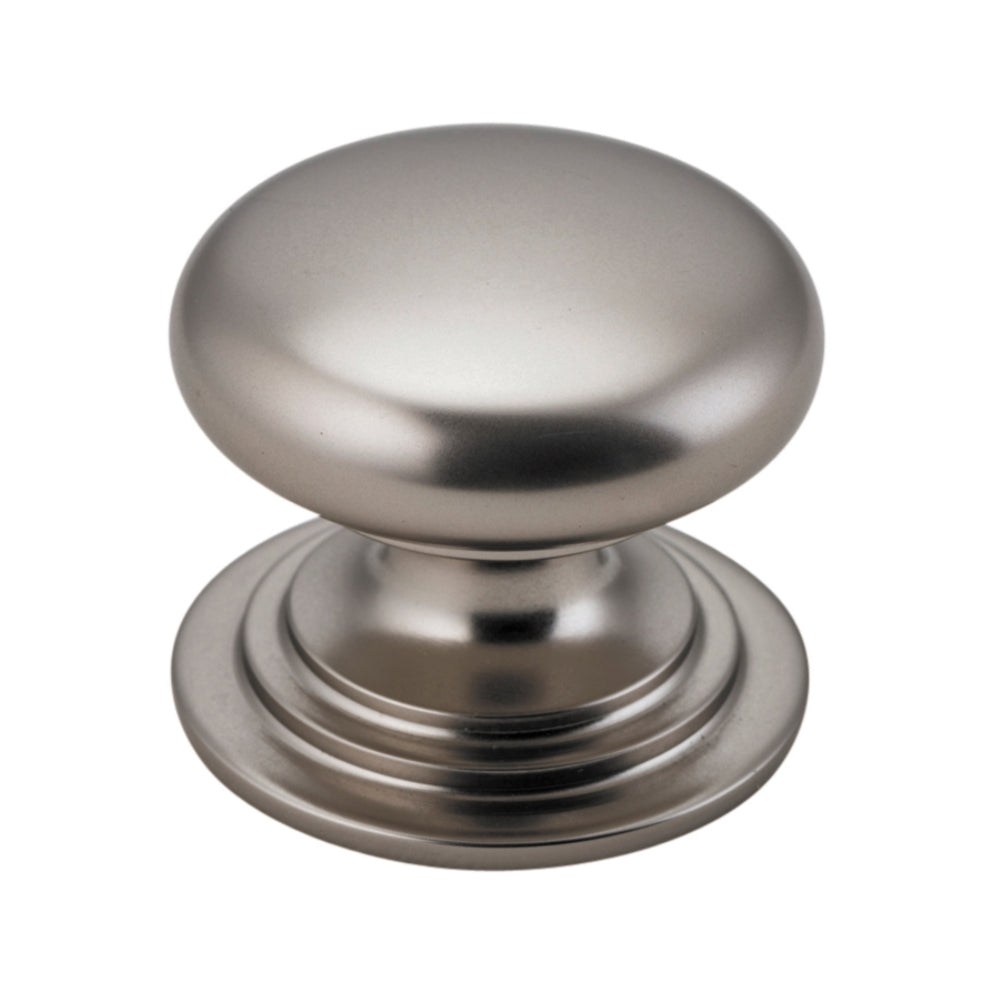 Iver Sarlat cupboard knob from architectural hardware collection, showing a close-up of the brass handle with vintage finish.