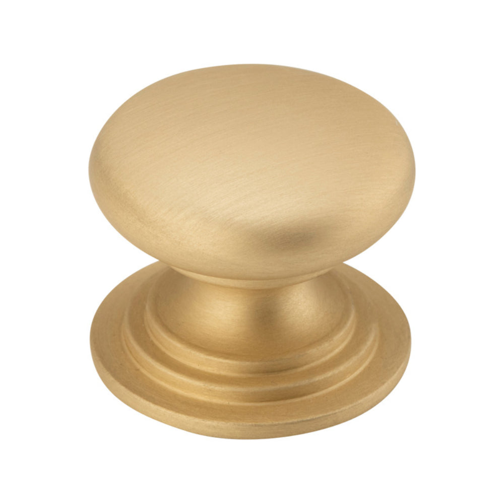Iver Sarlat cupboard knob, architectural hardware with a rounded metal design, mounted on a wooden cabinet door.