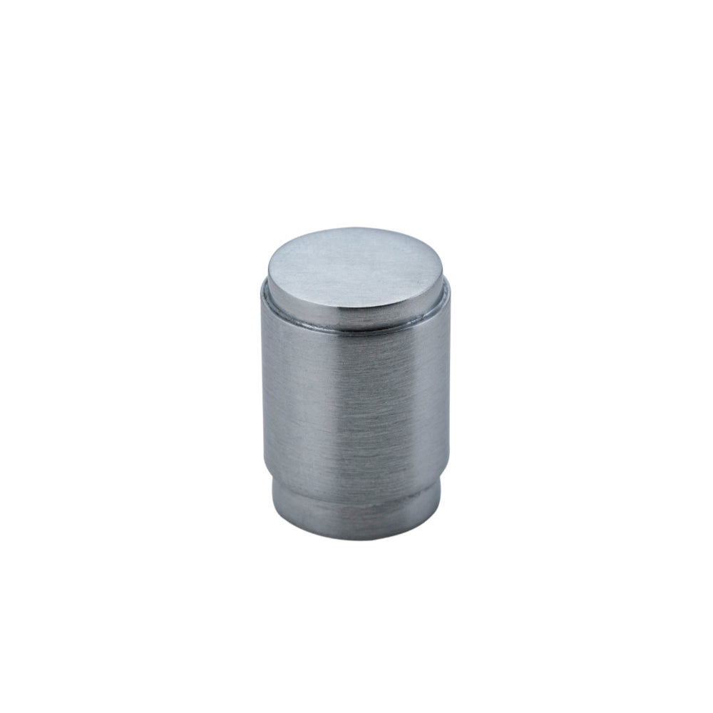 Iver Berlin cabinet knob showing a sleek, round metal hardware piece with a polished finish, mounted on a wooden cabinet door.