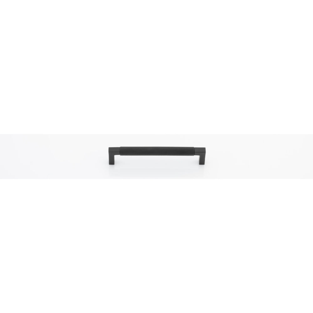 Iver Brunswick cabinet pull handle in brushed nickel finish, mounted on a wooden cabinet for a modern, stylish look.