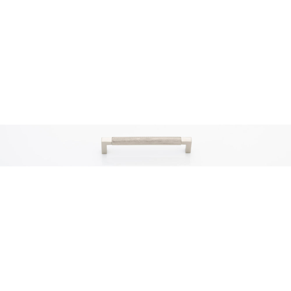 Iver Brunswick cabinet pull handle with a sleek, modern design, featuring a polished metal finish on a wooden cabinet.