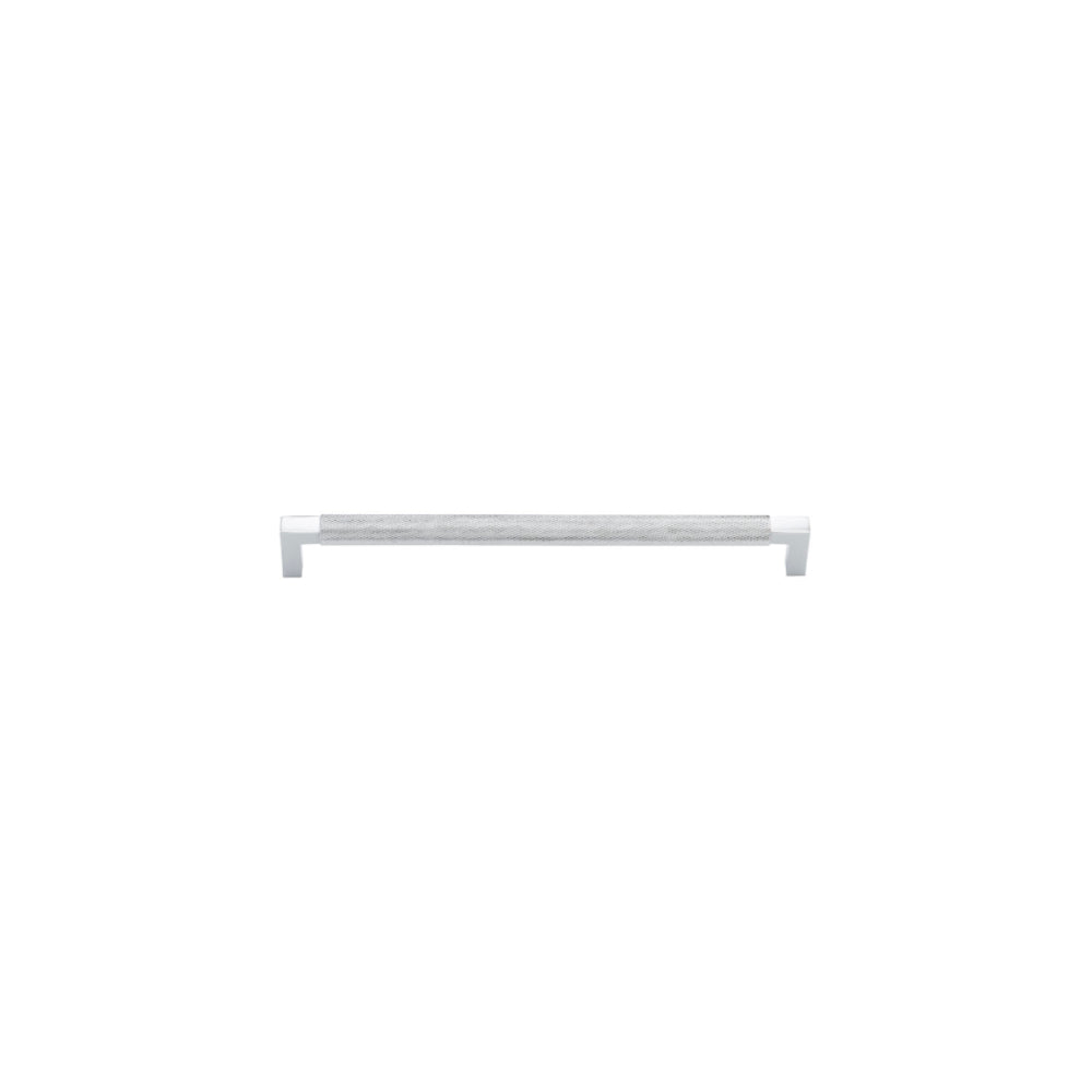 Iver Brunswick cabinet pull handle with a sleek, modern design, made of metal, mounted on a wooden cabinet door.