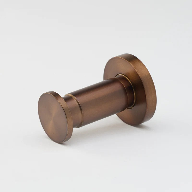 Lo & Co Lola towel hook in bronze, architectural hardware with a sleek, modern design for bathroom or kitchen use.
