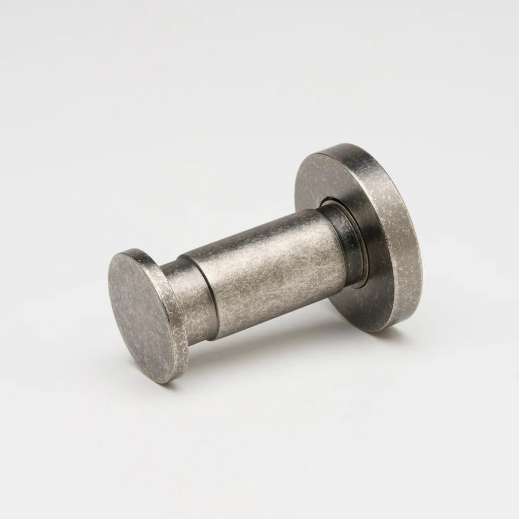Lo & Co Lola towel hook mounted on wall, modern architectural hardware in matte finish, designed for bathroom or kitchen use.