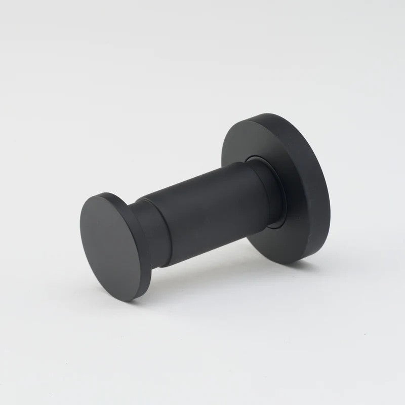 Lo & Co Lola towel hook from Lo & Co Interiors, a sleek architectural hardware piece in polished finish, mounted on wall.
