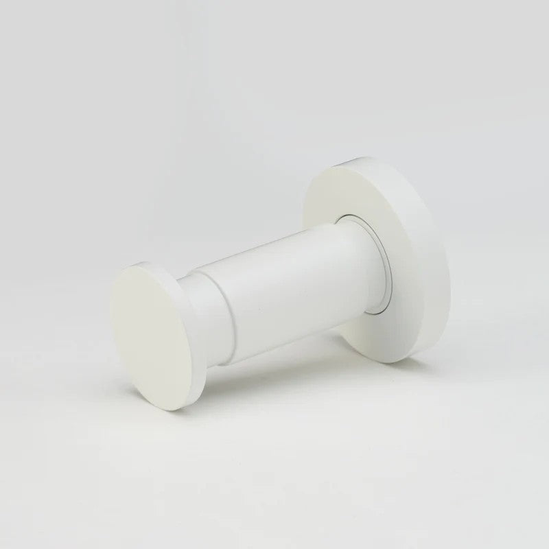 Lo & Co Lola towel hook mounted on wall, architectural hardware in white finish, sleek modern design for bathroom or kitchen.