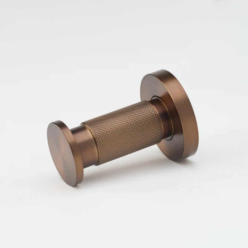 Lo & Co Kintore Towel Hook in matte brass, architectural hardware with a sleek, modern design for bathroom or kitchen use.