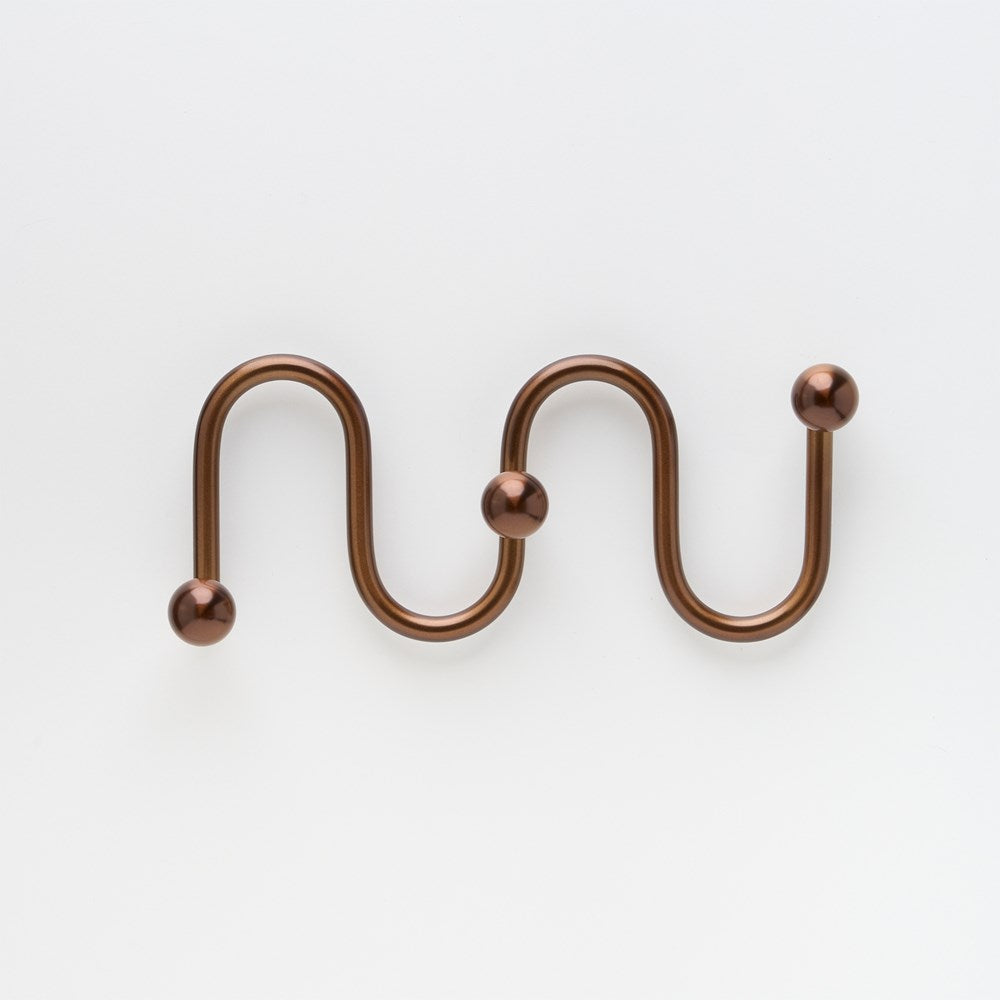 Lo & Co Sphere Hook XL architectural hardware in bronze finish, featuring a large spherical design for wall mounting.