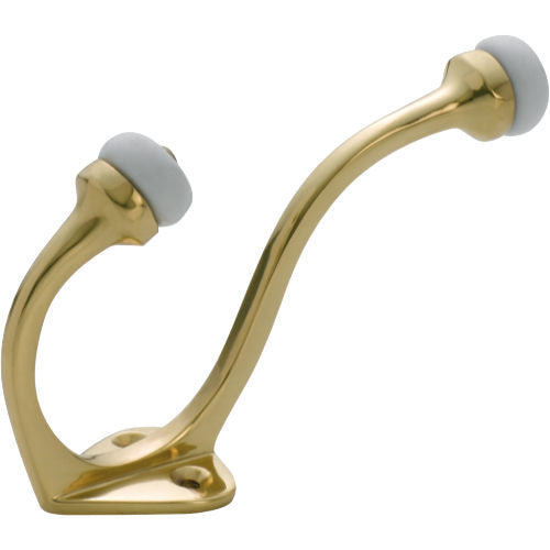 Tradco porcelain tip hat and coat hook mounted on a wall, showcasing a vintage-style bathroom or entryway accessory.
