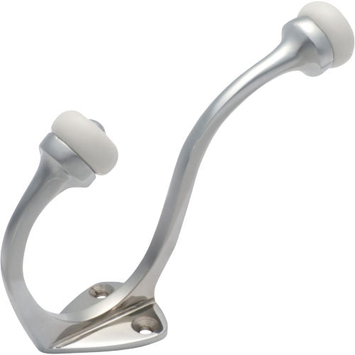 Tradco porcelain tip hat and coat hook mounted on wall, featuring a decorative design and sturdy hook for hanging items.